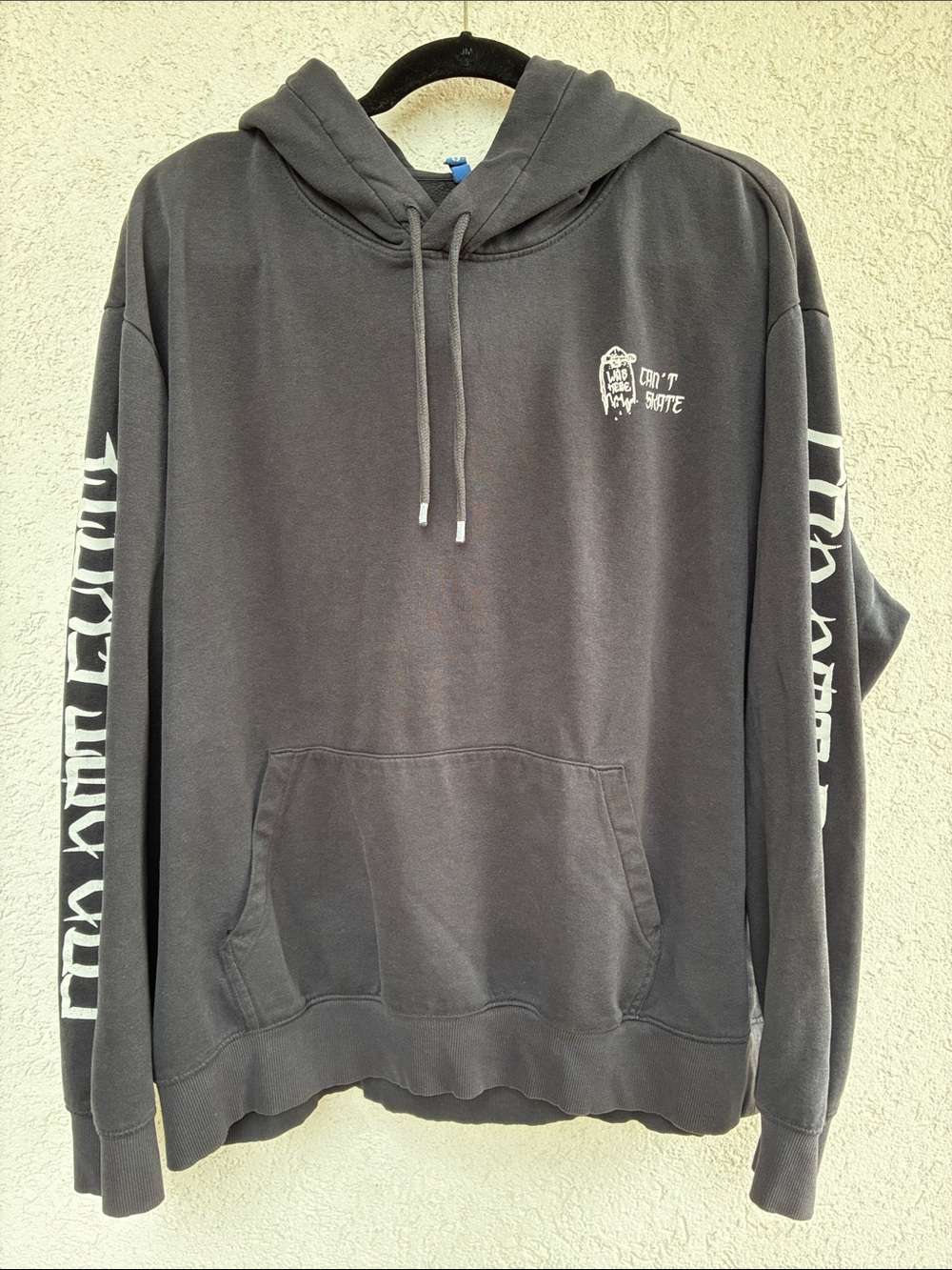 Divided “Skater can’t skate” “was here” black hoodie  skeleton hand broken board